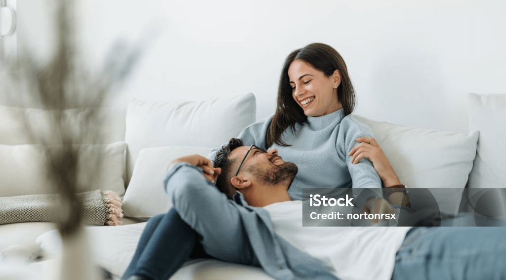 A Happy Couple in Their Living Room